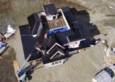 Nielsen-Roofing-new-black-metal-roof-install-aerial-view