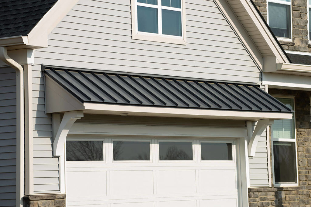 awning over garage door front home