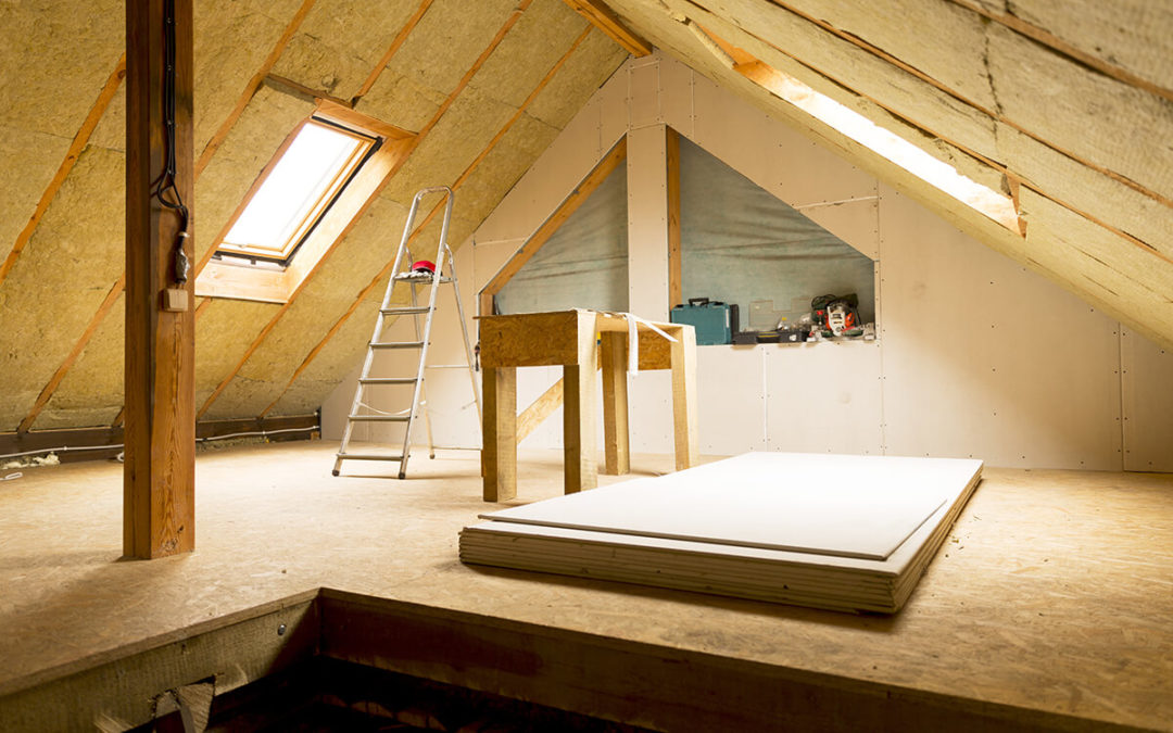 house attic under construction mansard wall insulation with rock wool