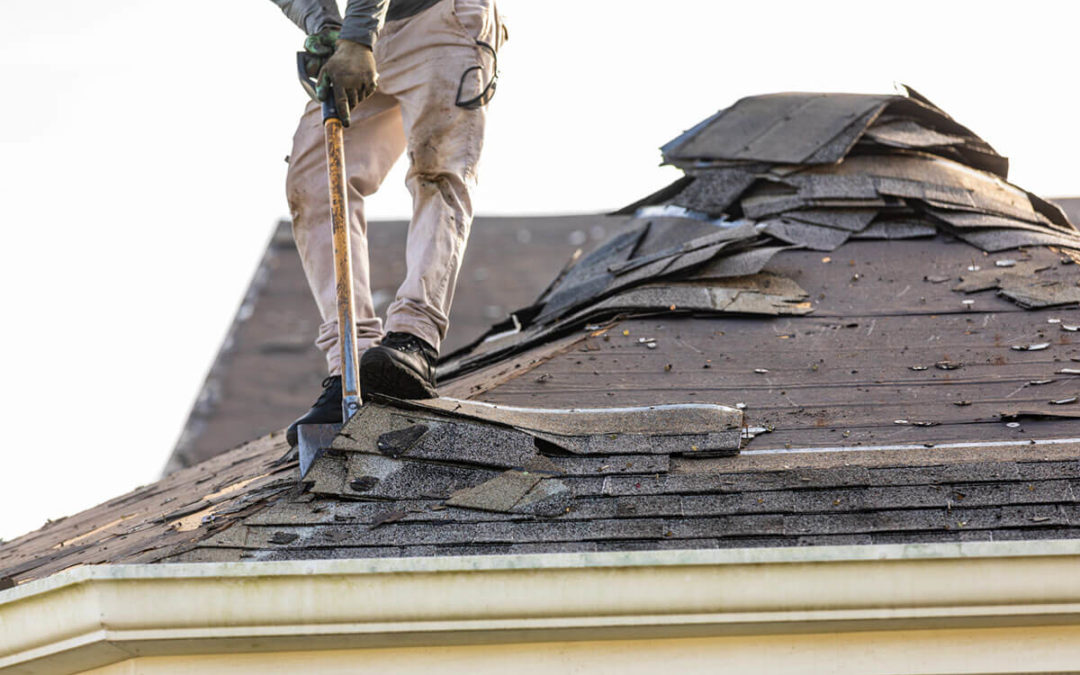 roofer removing roof nails